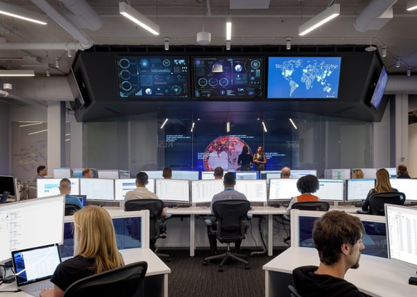 Employees working in cybersecurity center